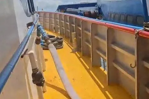  Yacht Photos Pics Custom-built offshore crew vessel deck, 2009 model, with safety railings and equipment.