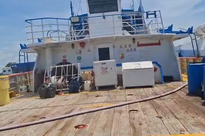  Yacht Photos Pics Custom built offshore crew vessel deck, 2009 model, featuring equipment and storage units.