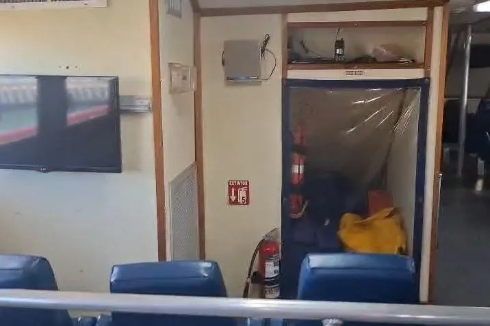  Yacht Photos Pics Interior of a 2009 custom-built offshore crew vessel with seating and safety equipment.