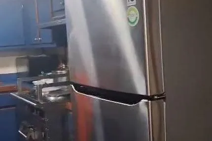  Yacht Photos Pics Stainless steel refrigerator in a modern kitchen on a 2009 custom-built offshore crew vessel.