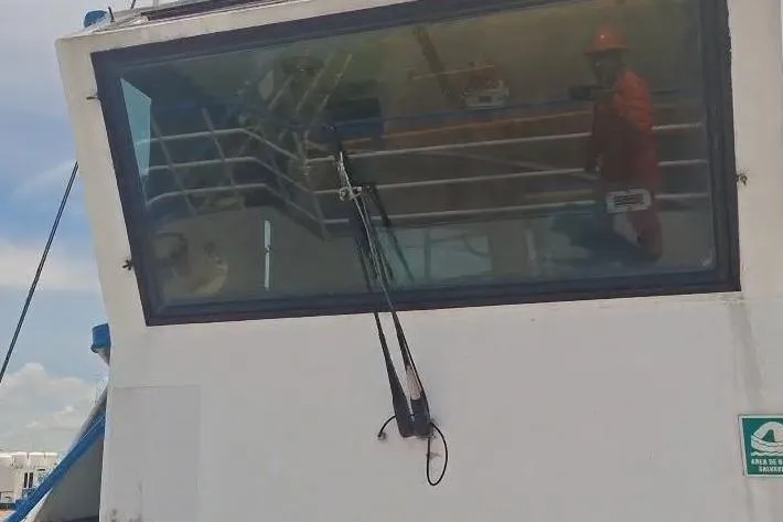  Yacht Photos Pics Custom built offshore crew vessel, 2009, with large front window and visible crew member.