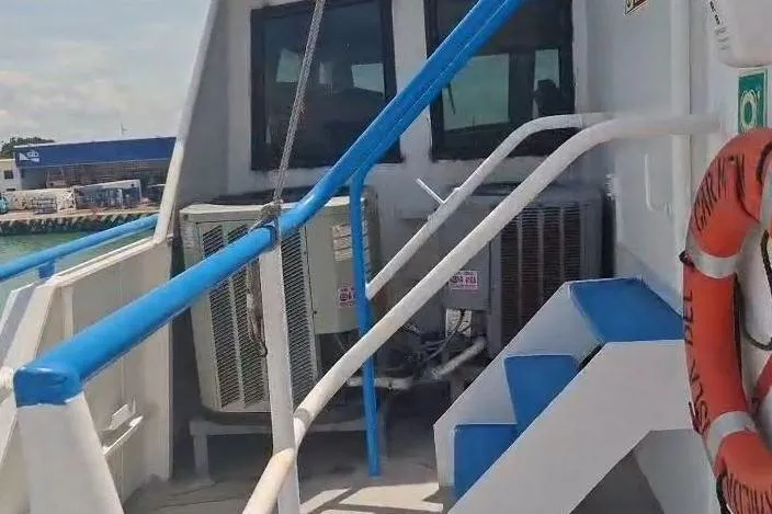  Yacht Photos Pics Custom-built offshore crew vessel, 2009, featuring blue railings and safety equipment on deck.