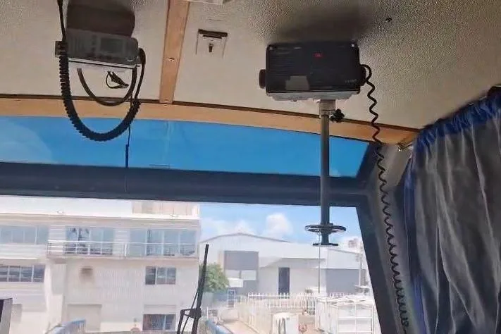  Yacht Photos Pics Interior view of a 2009 custom-built offshore crew vessel cockpit with navigation equipment.