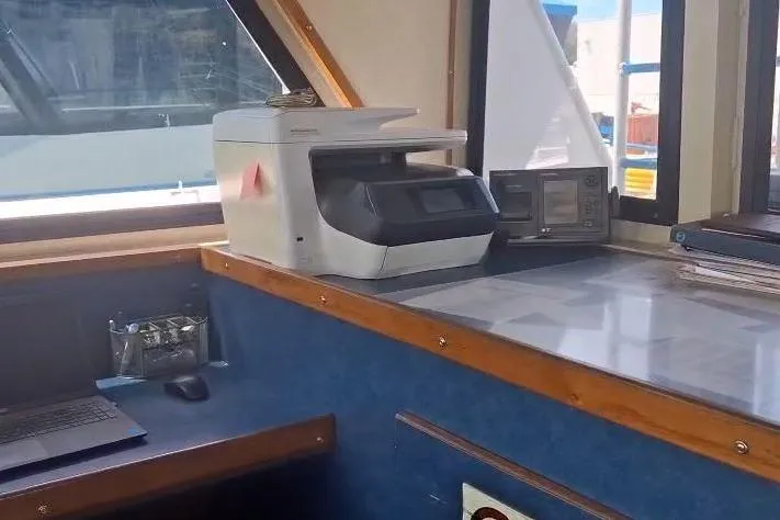  Yacht Photos Pics Office equipment inside a 2009 custom-built offshore crew vessel cabin.