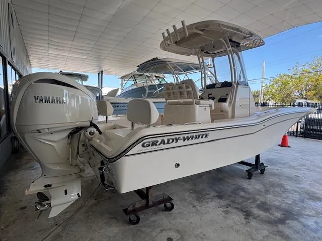  Yacht Photos Pics 2025 Grady-White 231 Coastal Explorer boat with Yamaha engine in showroom.