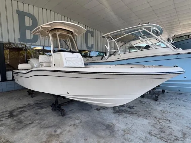  Yacht Photos Pics 2025 Grady-White 231 Coastal Explorer boat displayed in a showroom.