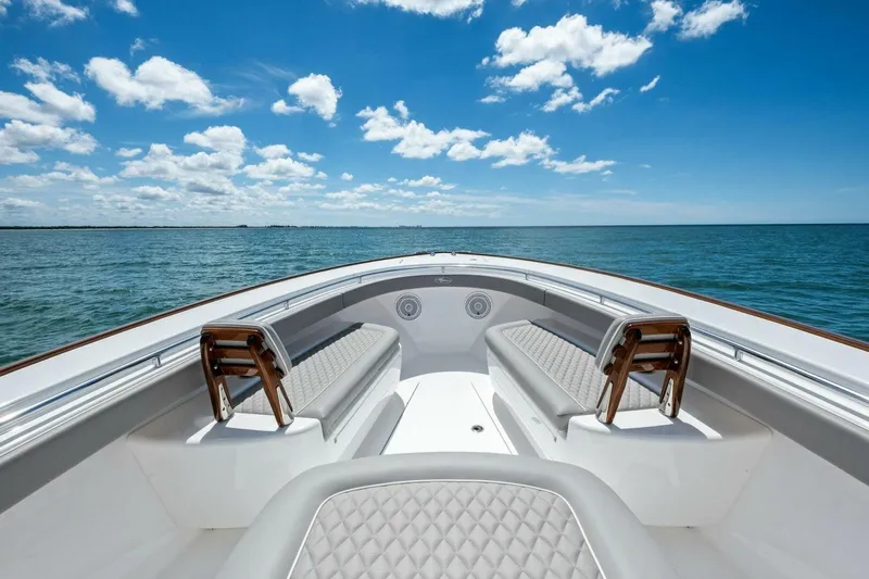 Galati Yacht Sales Trade Yacht Photos Pics 2025 Valhalla Boatworks V-37 on open water, featuring sleek seating and clear blue skies.