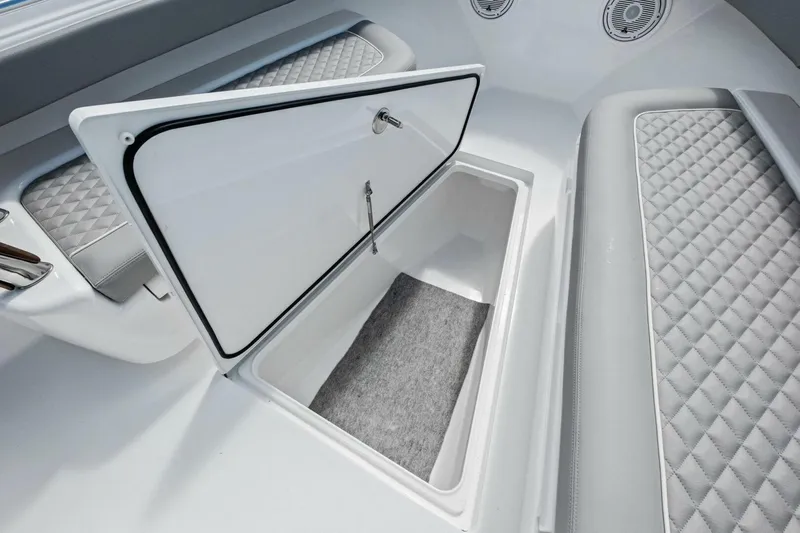 Galati Yacht Sales Trade Yacht Photos Pics 2025 Valhalla Boatworks V-37 interior storage compartment with quilted seating.