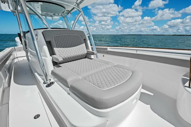 Galati Yacht Sales Trade Yacht Photos Pics 2025 Valhalla Boatworks V-37 with luxurious seating, cruising on a sunny day.