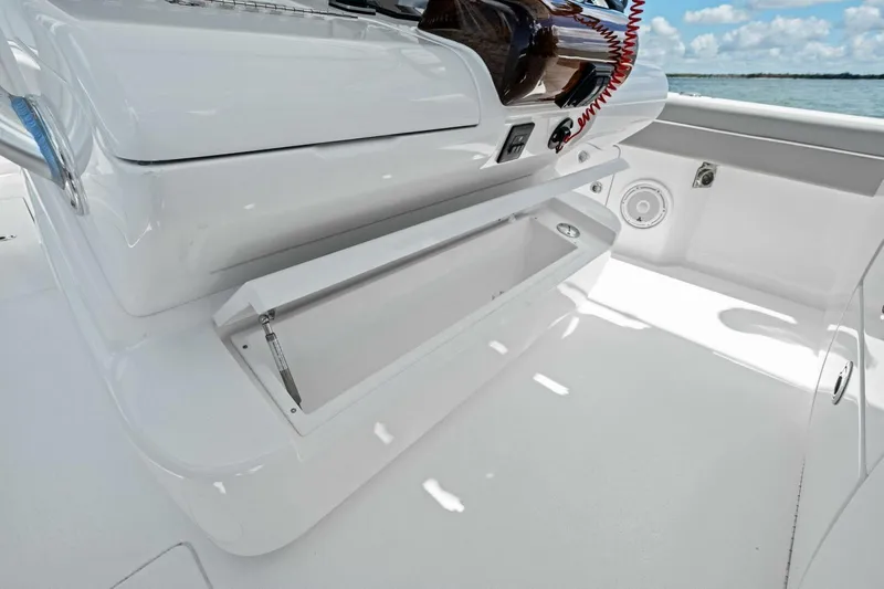 Galati Yacht Sales Trade Yacht Photos Pics 2025 Valhalla Boatworks V-37 interior storage compartment, sleek white design, open hatch.