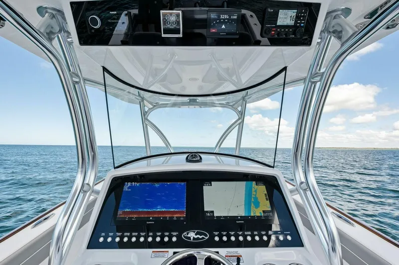 Galati Yacht Sales Trade Yacht Photos Pics 2025 Valhalla Boatworks V-37 helm with advanced navigation displays, open sea view.