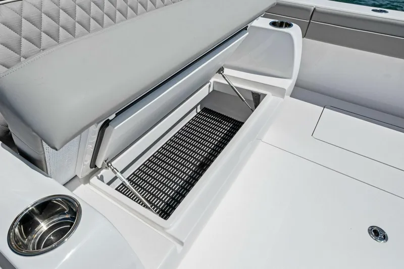 Galati Yacht Sales Trade Yacht Photos Pics 2025 Valhalla Boatworks V-37, featuring a sleek storage compartment and cup holder on deck.