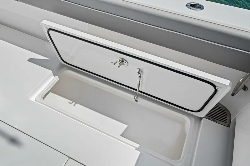 Galati Yacht Sales Trade Yacht Photos Pics 2025 Valhalla Boatworks V-37 storage compartment with open hatch, showcasing interior space.