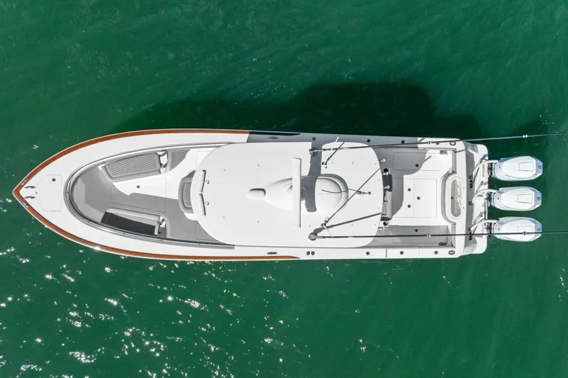 Galati Yacht Sales Trade Yacht Photos Pics Aerial view of 2025 Valhalla Boatworks V-37 on clear green water.