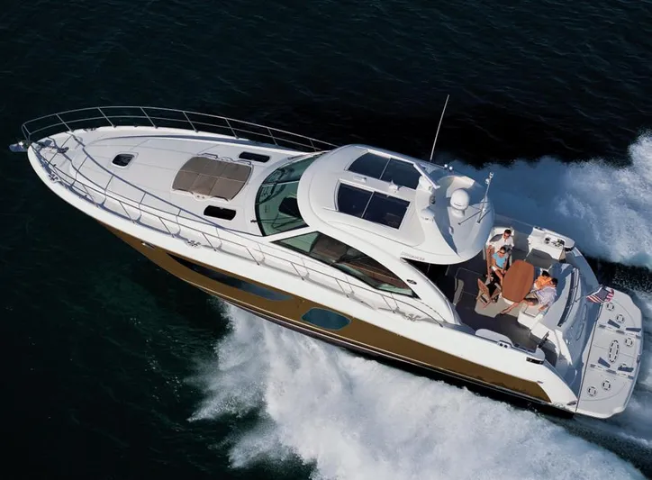  Yacht Photos Pics Manufacturer Provided Image: 2012 Sea Ray 610 Sundancer luxury yacht cruising on the water.