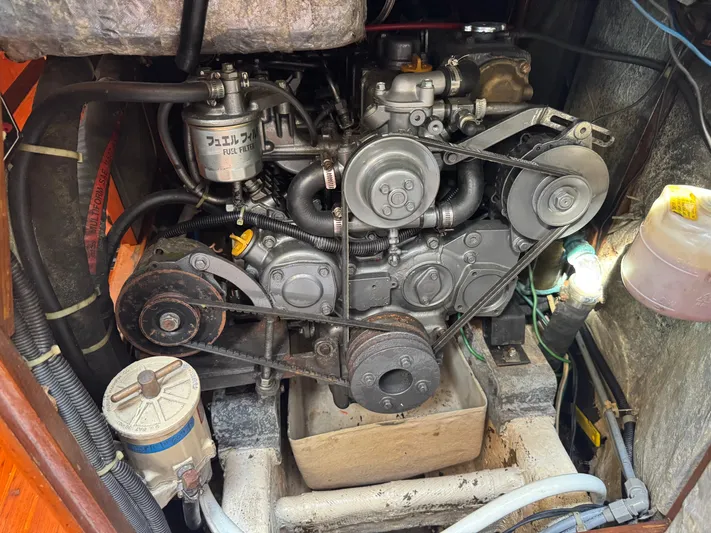 Dream Catcher Yacht Photos Pics Engine compartment of a 1995 Hylas 46 sailboat, showcasing mechanical components and belts.