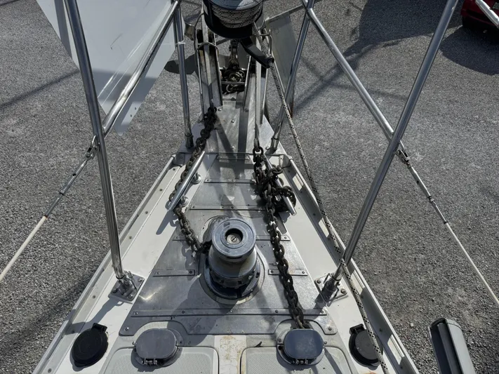 Dream Catcher Yacht Photos Pics Bow of a 1995 Hylas 46 sailboat with anchor chains and winch.