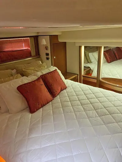  Yacht Photos Pics Luxurious bedroom interior of 2009 Sea Ray 58 Sedan Bridge yacht.