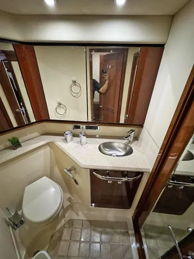  Yacht Photos Pics 2009 Sea Ray 58 Sedan Bridge bathroom with modern fixtures and elegant design.
