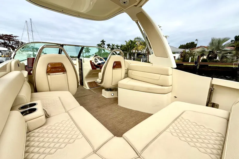  Yacht Photos Pics 2022 Chris-Craft Launch 25 GT interior with luxurious beige seating and elegant design.