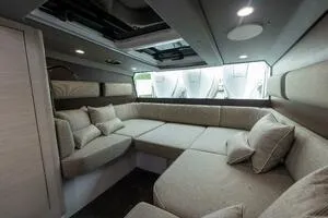 Stock 5 Yacht Photos Pics Luxurious interior of 2024 Axopar 45 boat with plush seating and modern design.