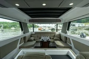 Stock 5 Yacht Photos Pics Interior of 2024 Axopar 45 boat, featuring spacious seating and modern design.