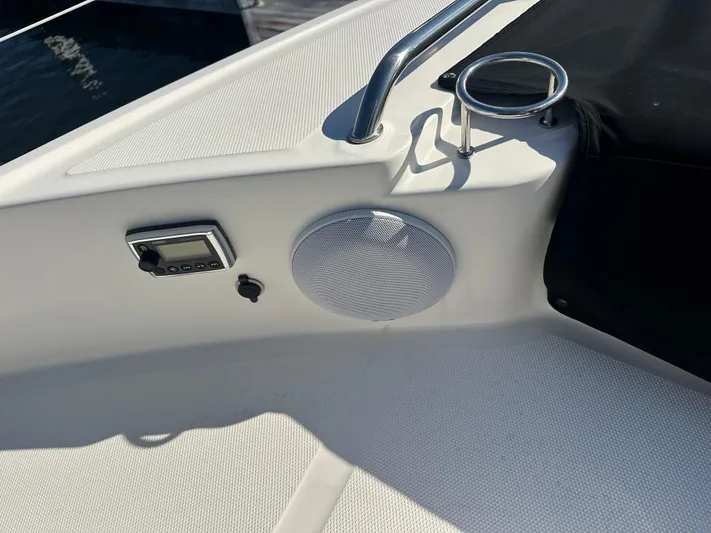 Working Late Yacht Photos Pics 2016 Sea Ray L590 Fly yacht deck with speaker and control panel.