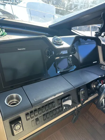 Working Late Yacht Photos Pics 2016 Sea Ray L590 Fly helm with advanced navigation displays and controls.