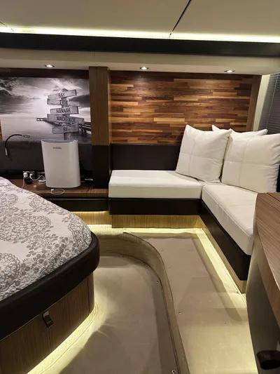 Working Late Yacht Photos Pics Luxurious interior of 2016 Sea Ray L590 Fly yacht with elegant seating and modern design.