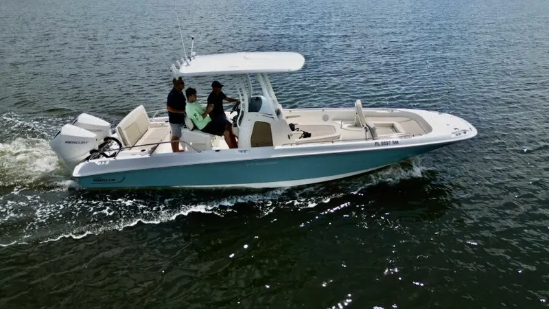  Yacht Photos Pics 2019 Boston Whaler DAUNTLESS boat cruising on open water.
