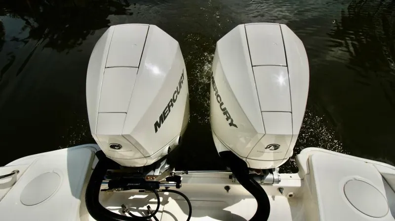  Yacht Photos Pics Twin Mercury outboard engines on a 2019 Boston Whaler DAUNTLESS boat.