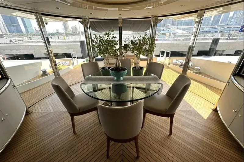  Yacht Photos Pics Luxurious 2003 Azimut 98 Leonardo yacht interior with elegant dining area and panoramic views.