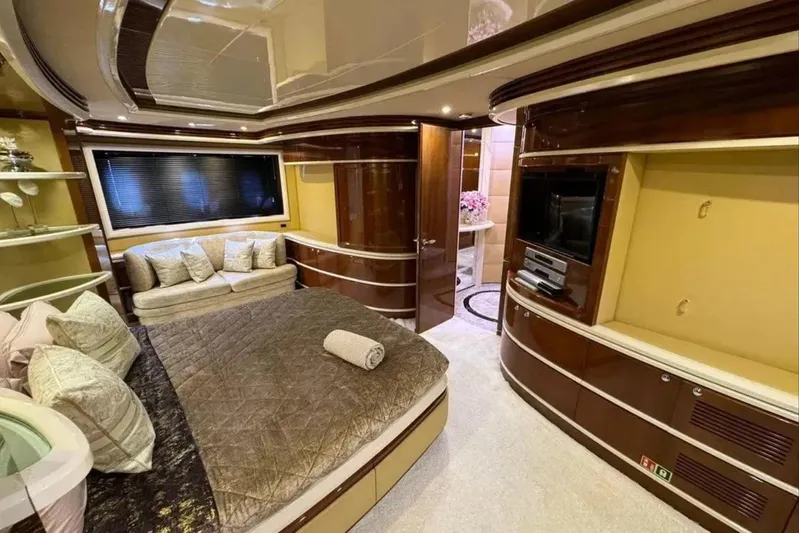  Yacht Photos Pics Luxurious interior of 2003 Azimut 98 Leonardo yacht with elegant bedroom and modern amenities.