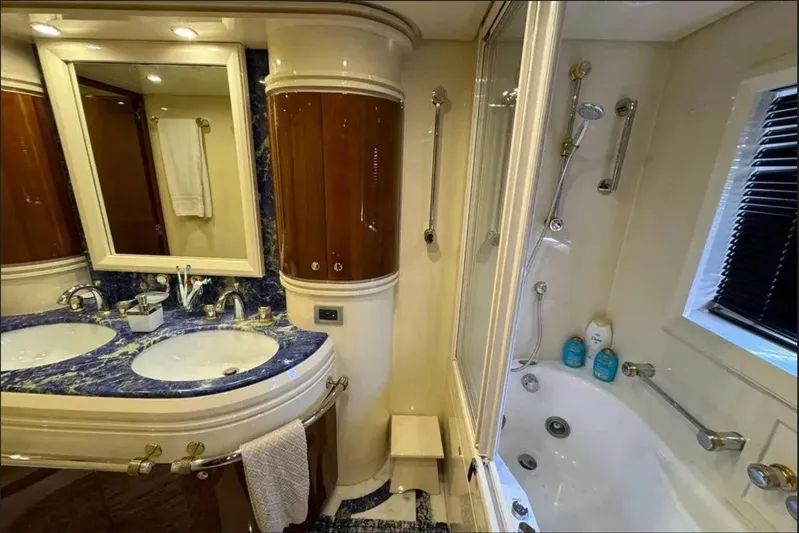  Yacht Photos Pics Luxurious bathroom in 2003 Azimut 98 Leonardo yacht with double sinks and elegant fixtures.