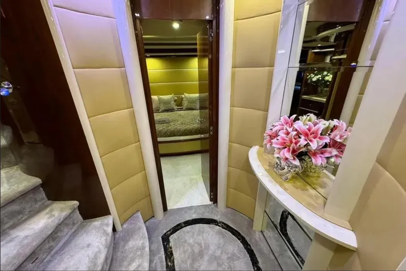  Yacht Photos Pics Luxurious interior of 2003 Azimut 98 Leonardo yacht with elegant decor and floral arrangement.