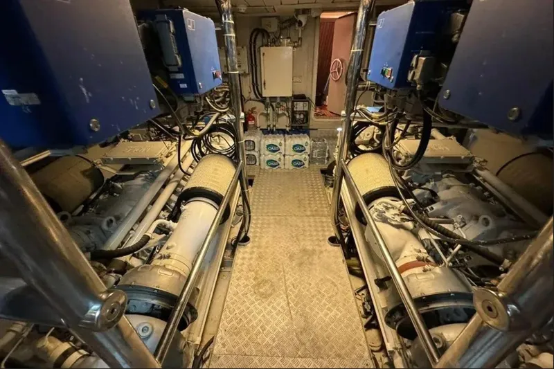  Yacht Photos Pics Engine room of 2003 Azimut 98 Leonardo yacht, featuring complex machinery and equipment.