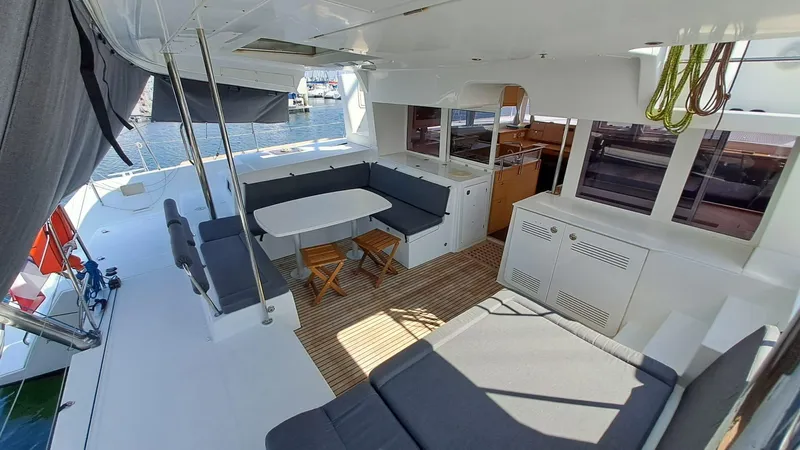  Yacht Photos Pics Spacious deck of 2012 Lagoon 450 F catamaran with seating and dining area.