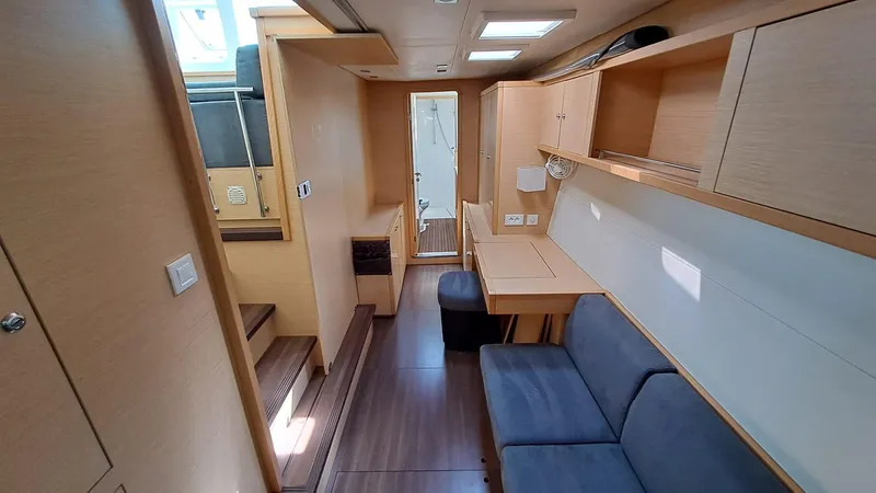  Yacht Photos Pics Interior of 2012 Lagoon 450 F yacht, featuring modern wood finish and comfortable seating.