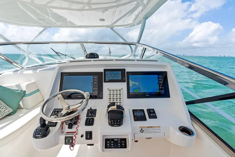  Yacht Photos Pics 2018 Intrepid 475 Sport Yacht helm with navigation screens and ocean view.