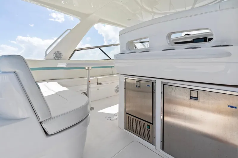  Yacht Photos Pics Luxurious interior of 2018 Intrepid 475 Sport Yacht with sleek seating and modern amenities.
