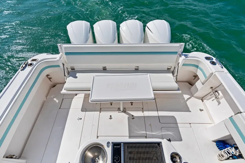  Yacht Photos Pics 2018 Intrepid 475 Sport Yacht deck with seating and outboard engines.