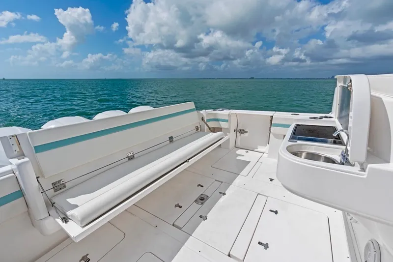  Yacht Photos Pics 2018 Intrepid 475 Sport Yacht deck with seating and ocean view.