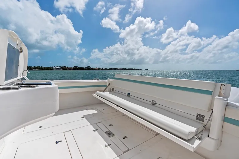  Yacht Photos Pics 2018 Intrepid 475 Sport Yacht deck with ocean view under blue sky.