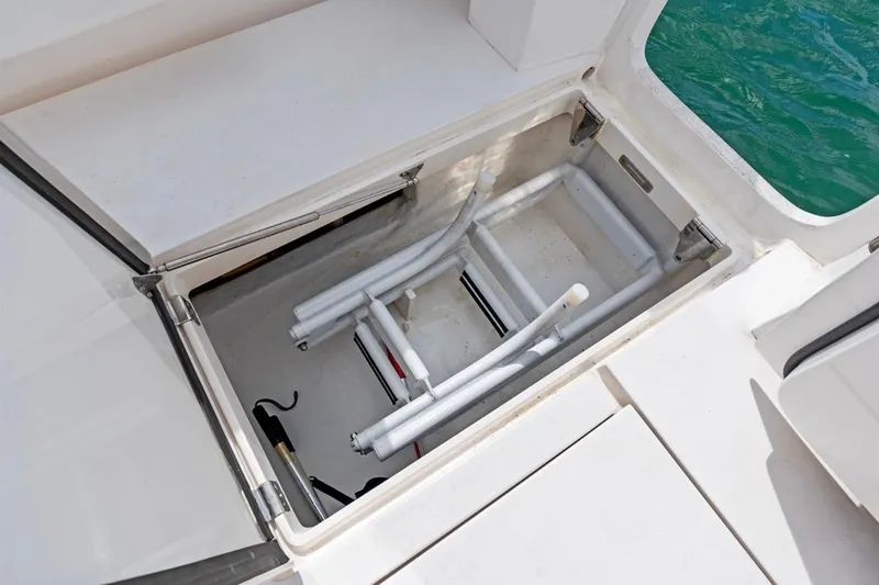  Yacht Photos Pics 2018 Intrepid 475 Sport Yacht hatch with ladder, open to reveal storage compartment.