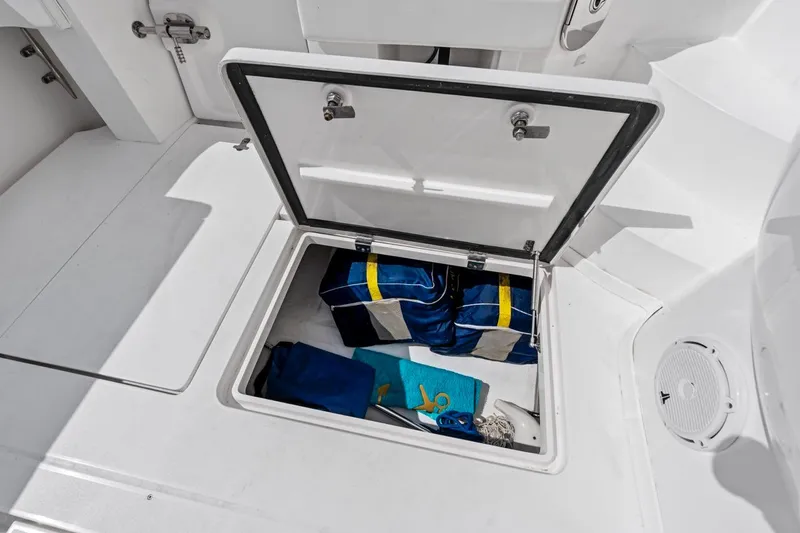  Yacht Photos Pics Storage compartment on 2018 Intrepid 475 Sport Yacht with life jackets and gear.