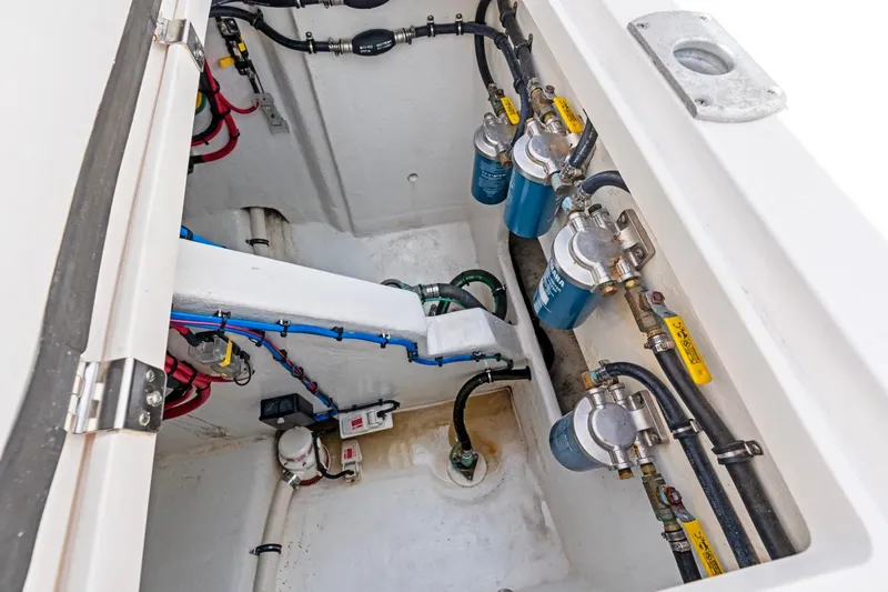  Yacht Photos Pics Engine compartment of 2018 Intrepid 475 Sport Yacht, showcasing fuel filters and wiring.