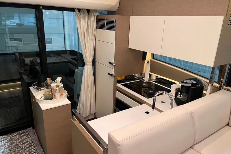  Yacht Photos Pics Luxurious kitchen interior of 2018 Prestige 520 yacht with modern appliances and elegant design.