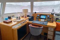 Luxurious Nautitech 542 yacht interior with navigation station, desk, and decor, 2013 model.