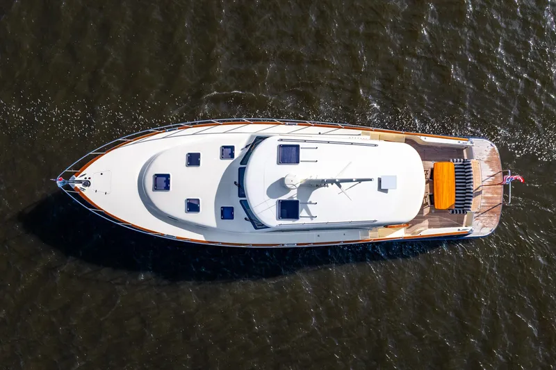 Pitt Stop Yacht Photos Pics Aerial view of 2020 Palm Beach Motor Yachts PB55 cruising on water.