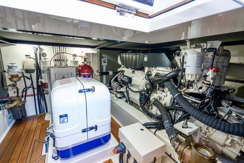 Pitt Stop Yacht Photos Pics Engine room of 2020 Palm Beach Motor Yachts PB55, showcasing advanced mechanical systems.